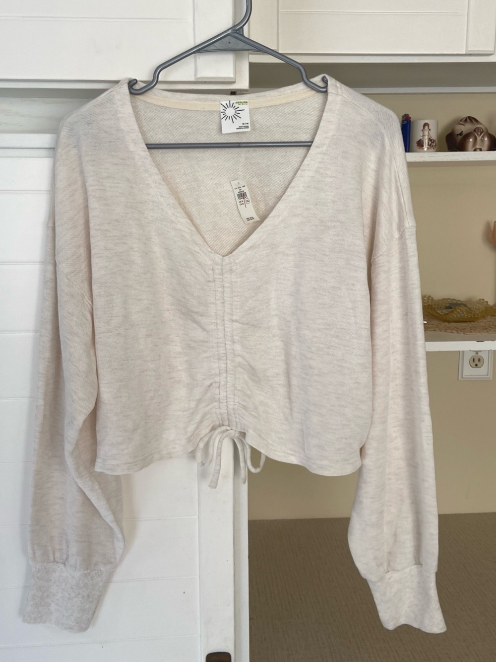 New With Tags cream long sleeve top with tie detail